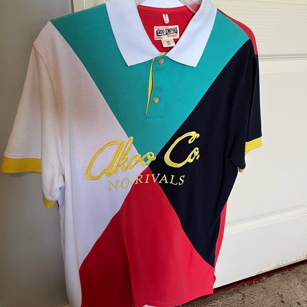 Akoo polo size medium with tags